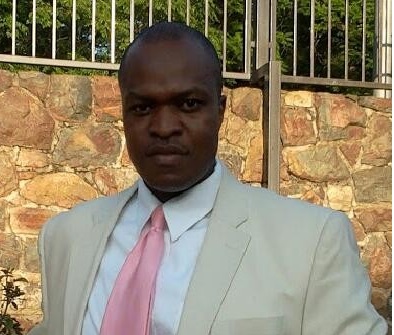 James Amoh wearing a suit