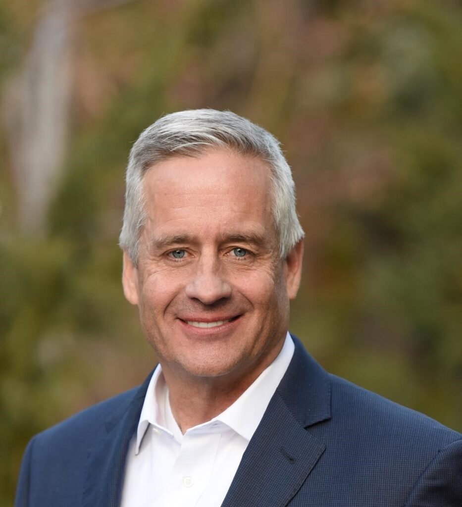 Leonard Johnson in a suit without a tie