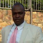 James Amoh wearing a suit